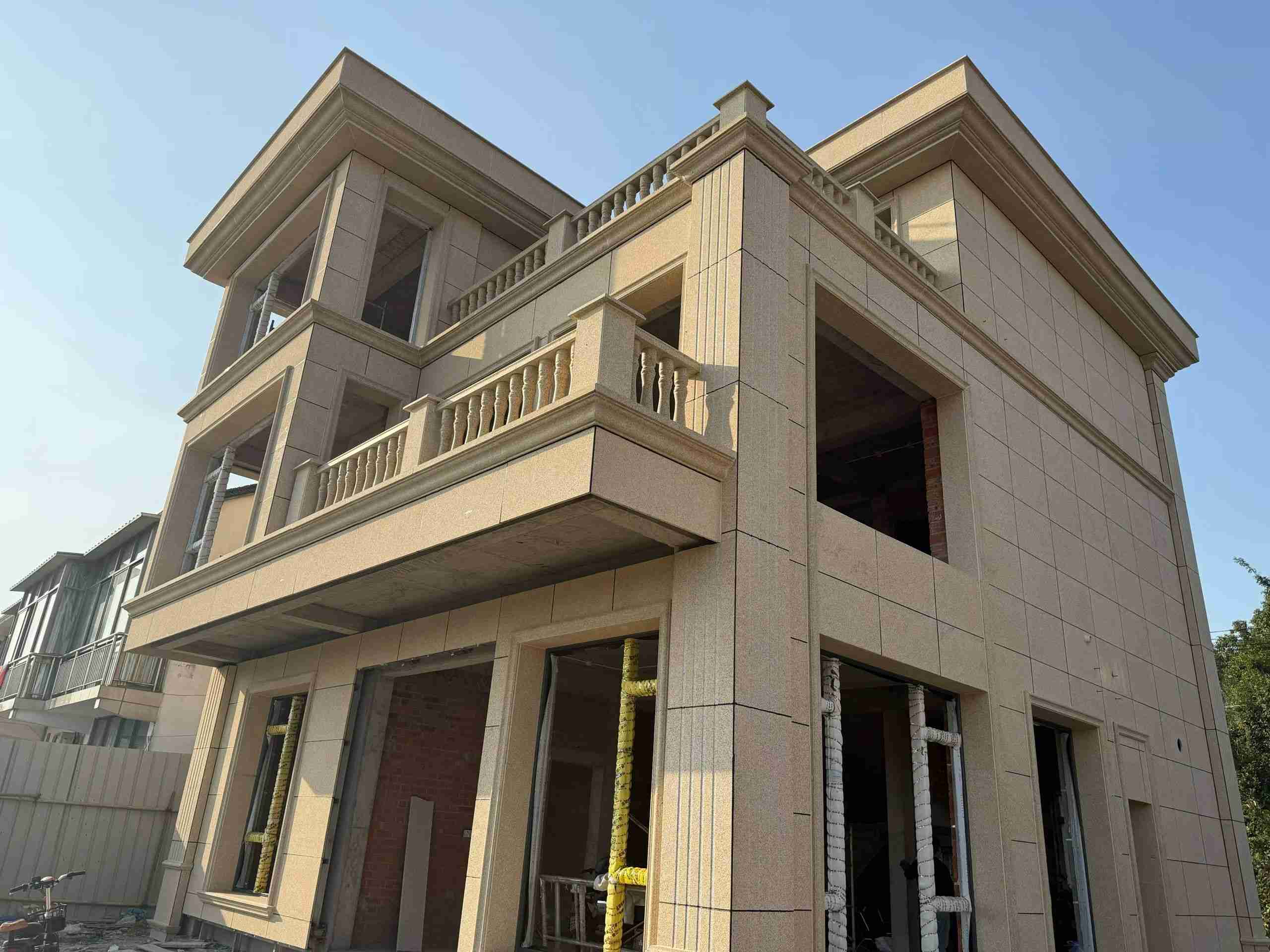 徐州 黄金麻花岗岩石材荔枝面外墙干挂效果展示